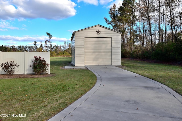 garage with a yard