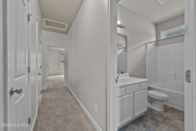 full bathroom featuring bathtub / shower combination, a textured ceiling, vanity, and toilet