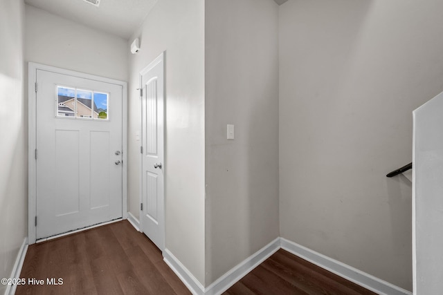 doorway featuring dark hardwood / wood-style flooring