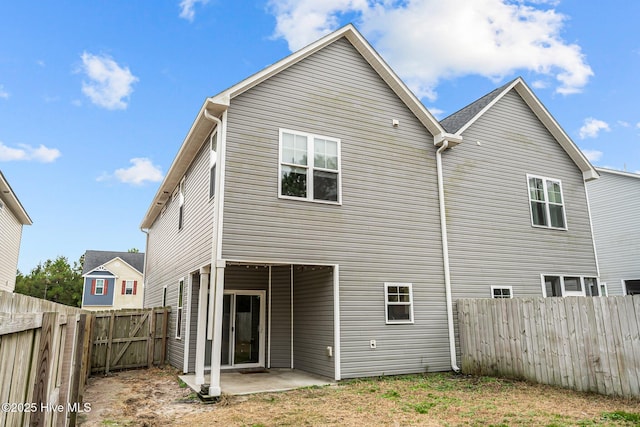 rear view of house featuring a patio area