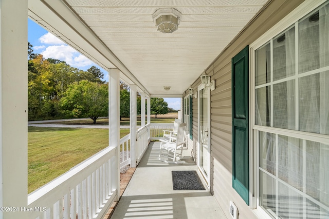 balcony featuring a porch