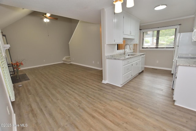 28 Winders Crk, Rocky Mount, NC 27804 - kitchen with ceiling fan, a sink, dishwasher, white cabinets, and light wood-type flooring