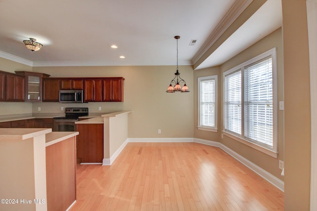 kitchen featuring range with electric stovetop, light hardwood / wood-style floors, and ornamental molding