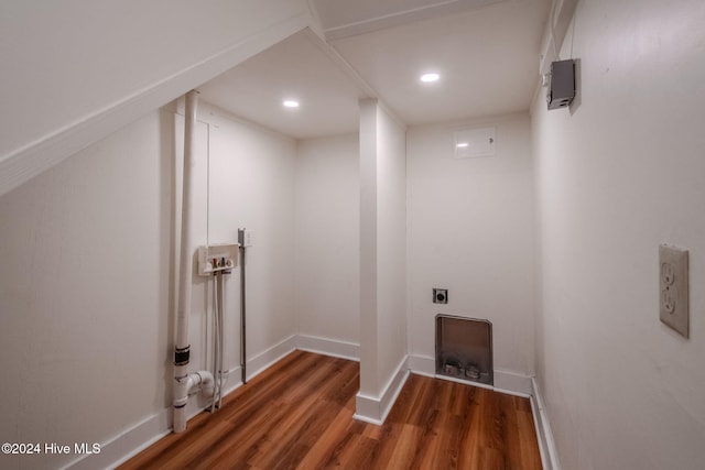 laundry room with dark wood-type flooring and hookup for an electric dryer