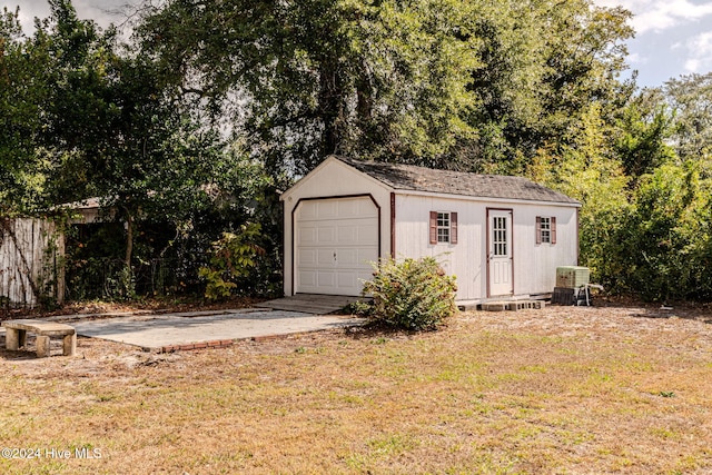 garage with a lawn