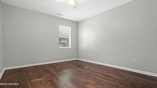 empty room with hardwood / wood-style flooring and ceiling fan