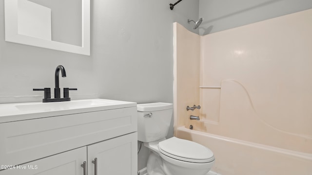 full bathroom with vanity, bathing tub / shower combination, and toilet