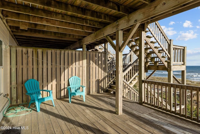 deck featuring a water view