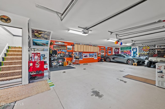 garage featuring a garage door opener