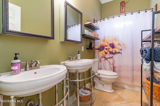 bathroom featuring tile patterned flooring, walk in shower, and toilet