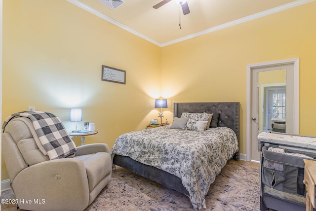 bedroom with crown molding and ceiling fan