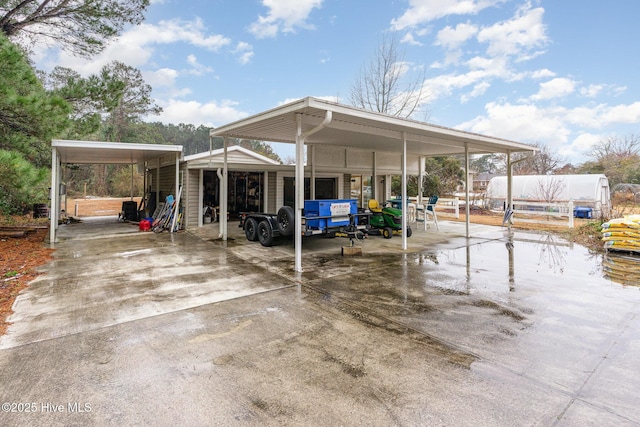 view of patio / terrace featuring a carport