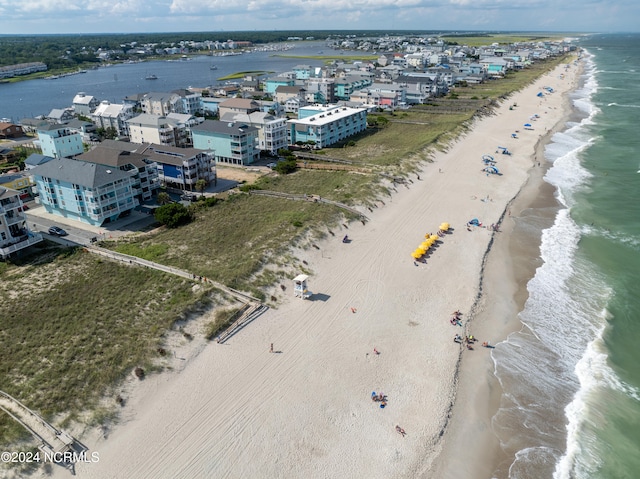 aerial view with a view of the beach and a water view