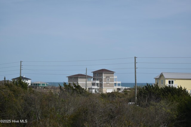 view of front of house featuring a front yard and covered porch