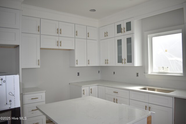 bathroom with vanity, toilet, and a bathing tub