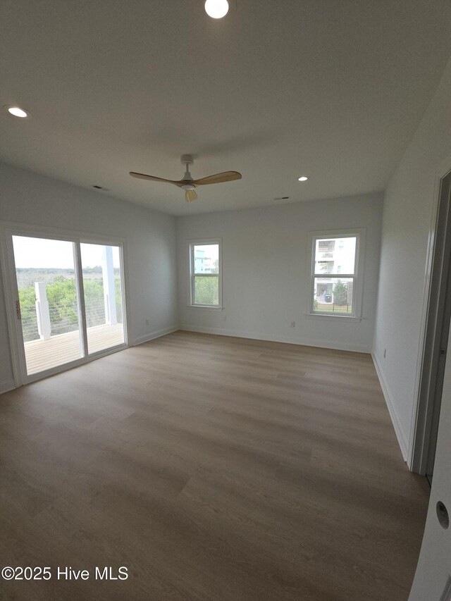 109 Old Village Ln, North Topsail Beach, NC 28460 - empty room with wood finished floors, recessed lighting, baseboards, and ceiling fan