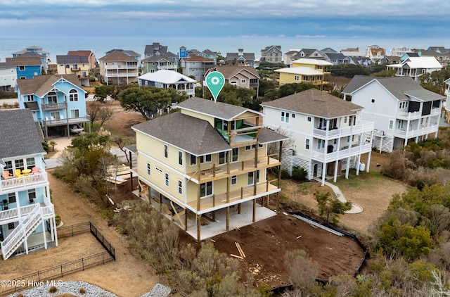 birds eye view of property with a residential view