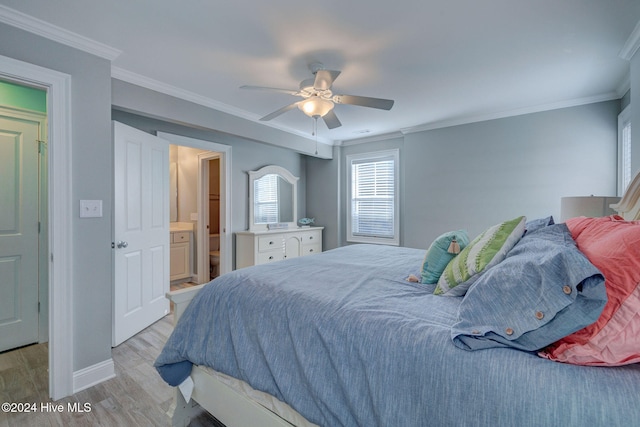 bedroom with ensuite bath, light wood-type flooring, ceiling fan, and crown molding