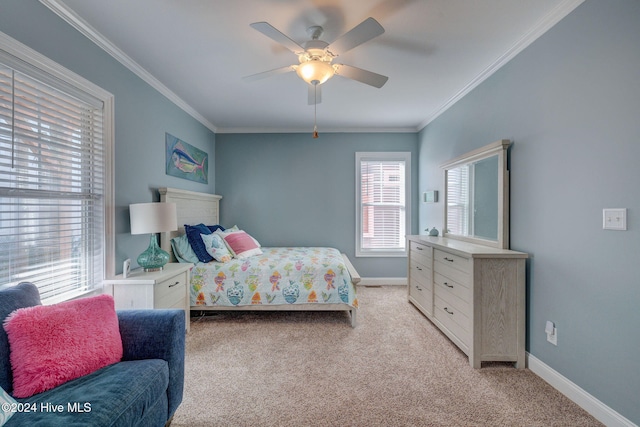 bedroom featuring light carpet, ceiling fan, and crown molding