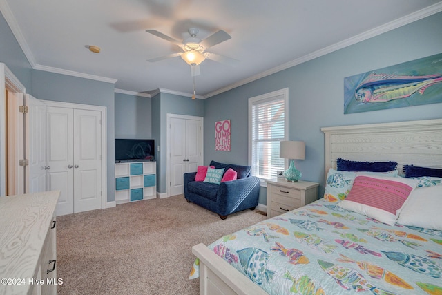 carpeted bedroom with ornamental molding and ceiling fan