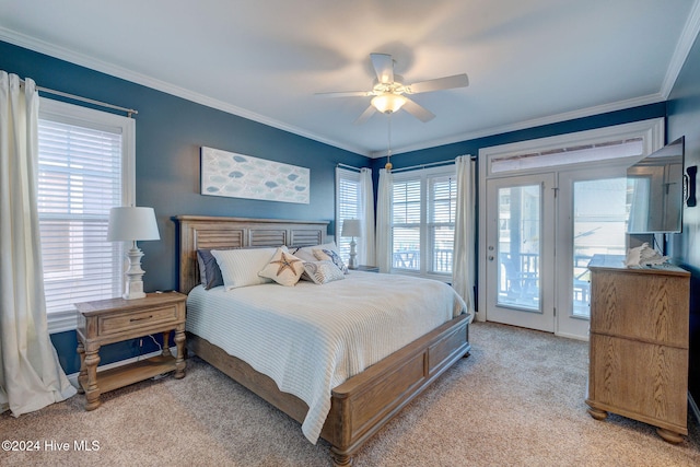 carpeted bedroom with ceiling fan, access to exterior, multiple windows, and crown molding