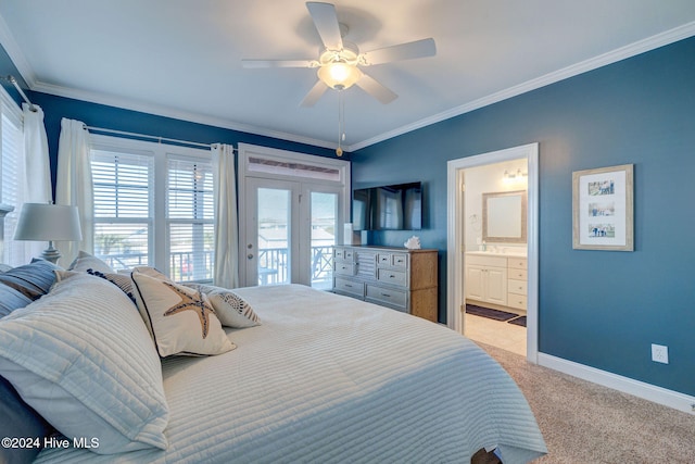 carpeted bedroom with ceiling fan, access to exterior, ensuite bath, and ornamental molding