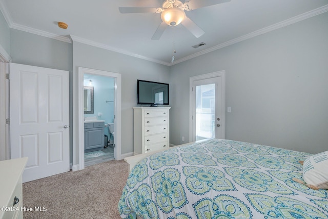 carpeted bedroom with ornamental molding, ensuite bath, and ceiling fan