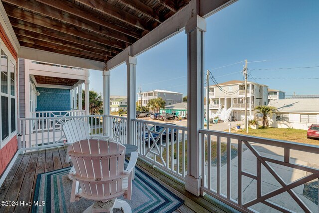 230 Third Ave Unit A, Kure Beach, NC 28449 - balcony featuring a residential view