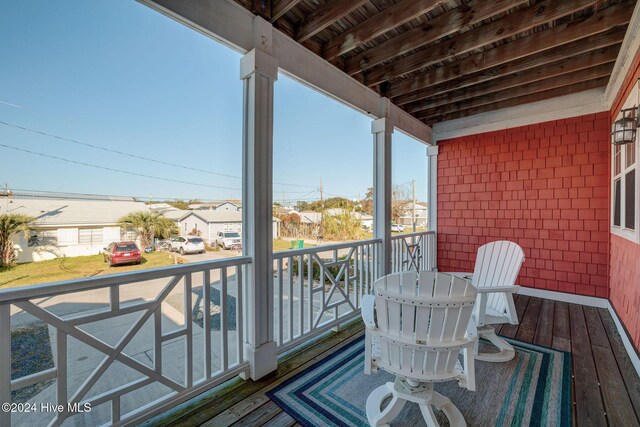 230 Third Ave Unit A, Kure Beach, NC 28449 - balcony featuring a residential view