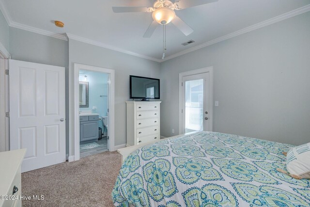 230 Third Ave Unit A, Kure Beach, NC 28449 - carpeted bedroom featuring crown molding, ensuite bath, and a ceiling fan