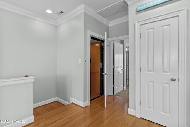 230 Third Ave Unit A, Kure Beach, NC 28449 - corridor with baseboards, light wood-style floors, crown molding, and recessed lighting