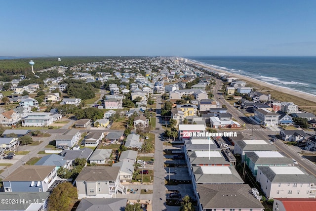 aerial view with a beach view and a water view