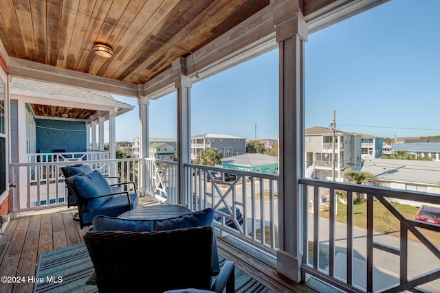 230 Third Ave Unit A, Kure Beach, NC 28449 - wooden deck featuring a residential view