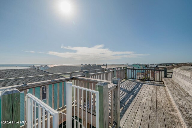 230 Third Ave Unit A, Kure Beach, NC 28449 - wooden deck with a water view