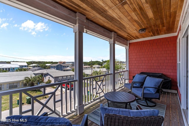 230 Third Ave Unit A, Kure Beach, NC 28449 - balcony featuring a residential view