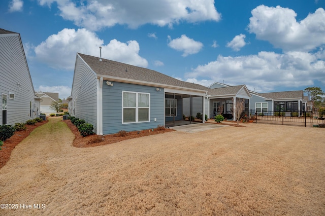 back of house with a patio area