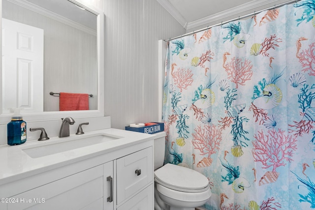 bathroom featuring ornamental molding, curtained shower, vanity, and toilet