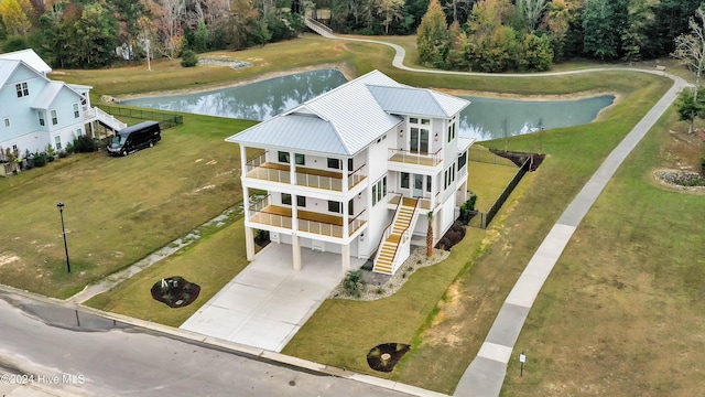 drone / aerial view with a water view