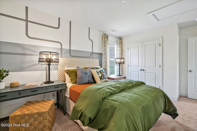 carpeted bedroom with a closet