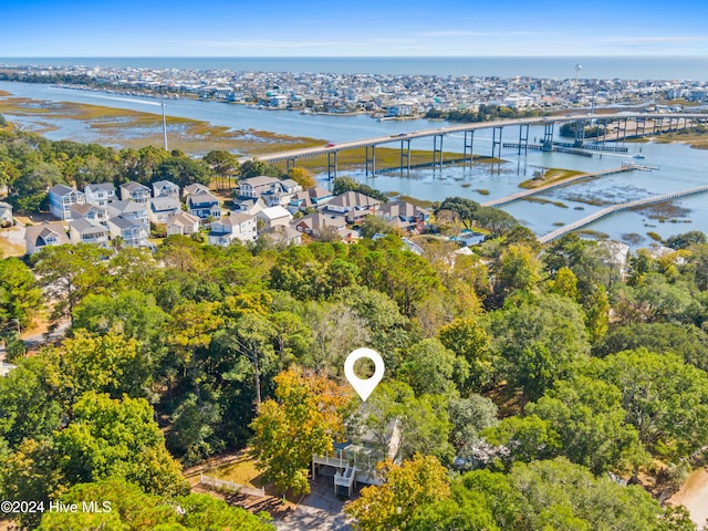 drone / aerial view with a water view