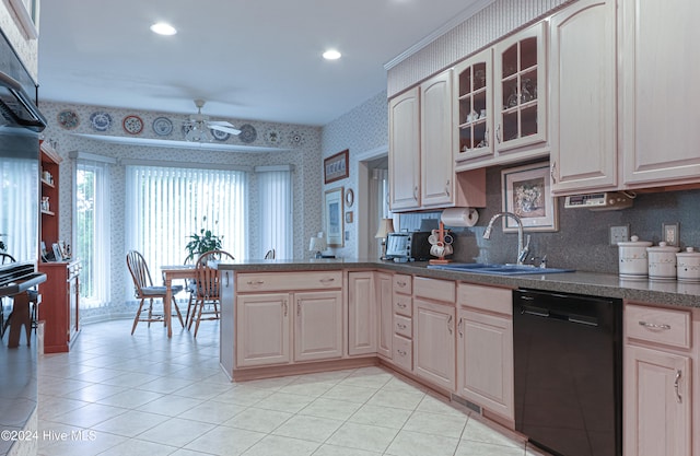 kitchen with dishwasher, ceiling fan, light tile patterned floors, and sink