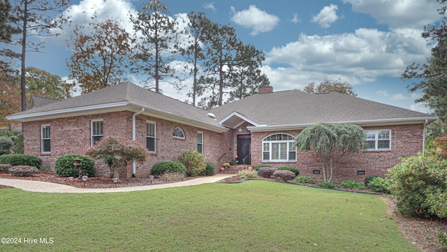 single story home featuring a front yard