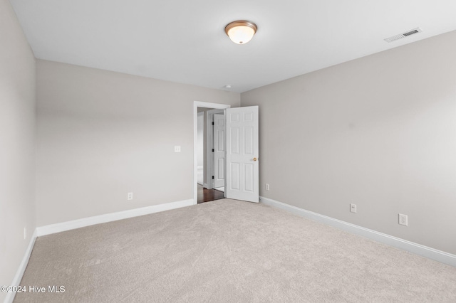 empty room with carpet floors