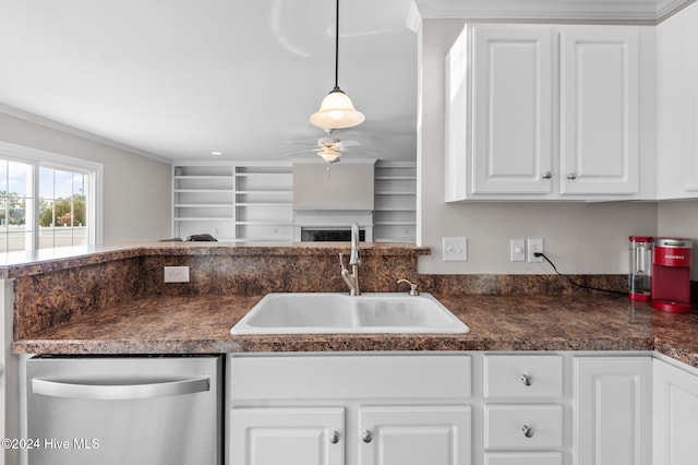 kitchen with white cabinetry, pendant lighting, sink, stainless steel dishwasher, and ceiling fan