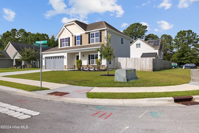 view of front of home with a porch and a front lawn