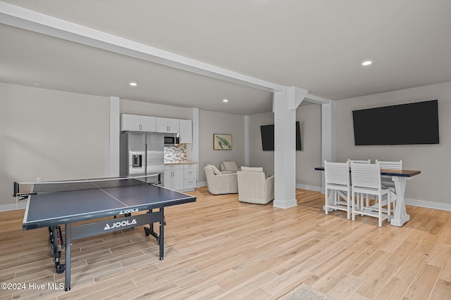 recreation room featuring light hardwood / wood-style floors