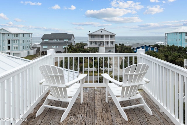 wooden terrace with a water view