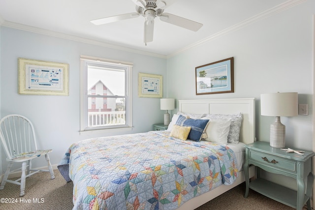 carpeted bedroom featuring ceiling fan and ornamental molding