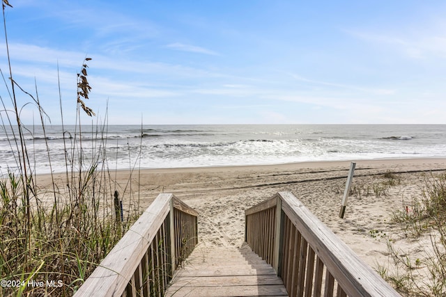 exterior space featuring a beach view