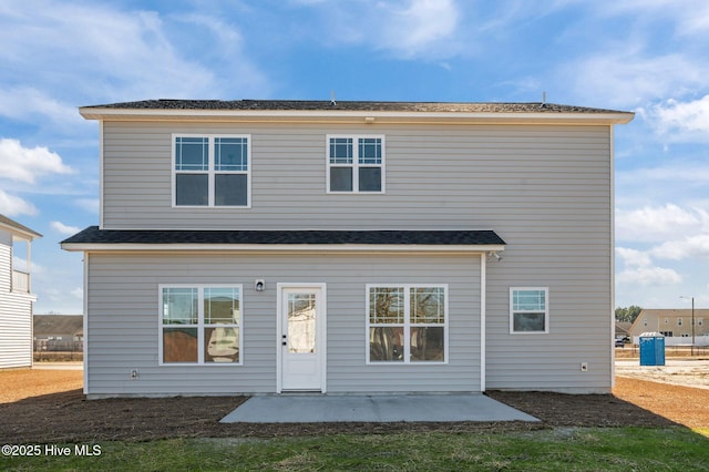 back of house with a patio area